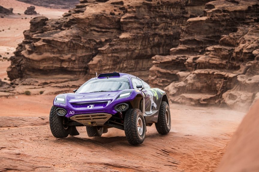 Extreme E cars racing side by side